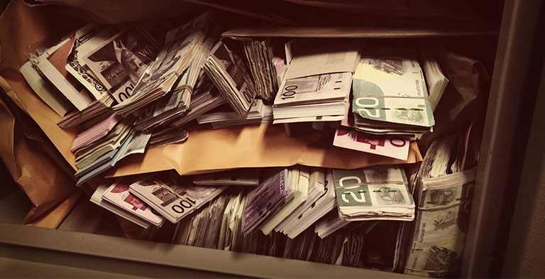 safe filled with money