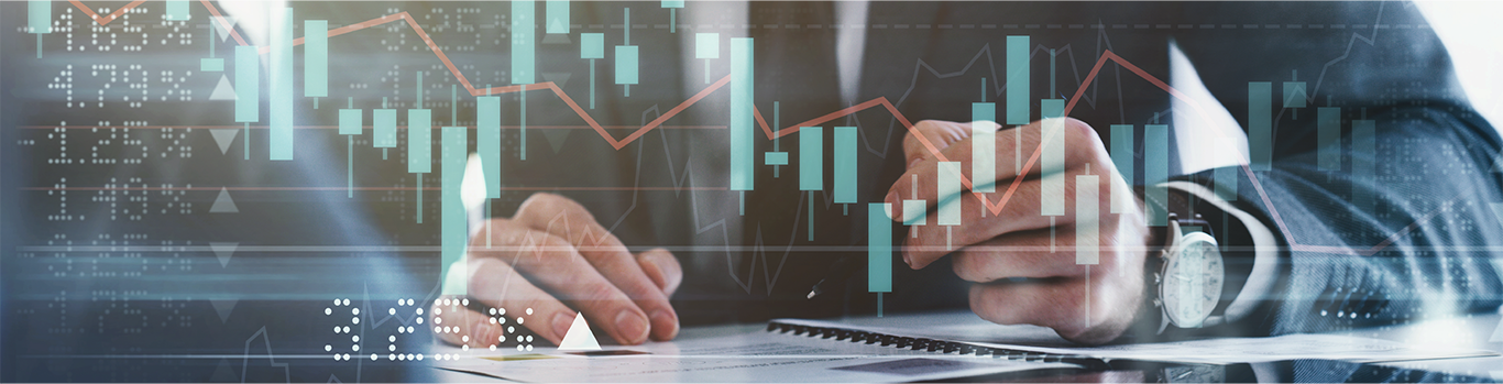 A person's arms on a table, bar charts are overlayed on top of the photo