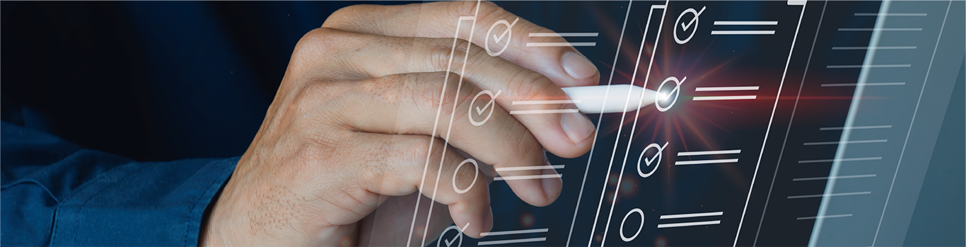 Hand holding a capacitive pen, tapping on a checkmark icon