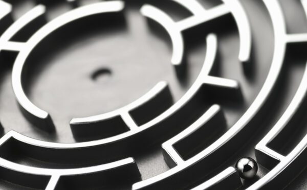 Close up of ball maze with ball in maze